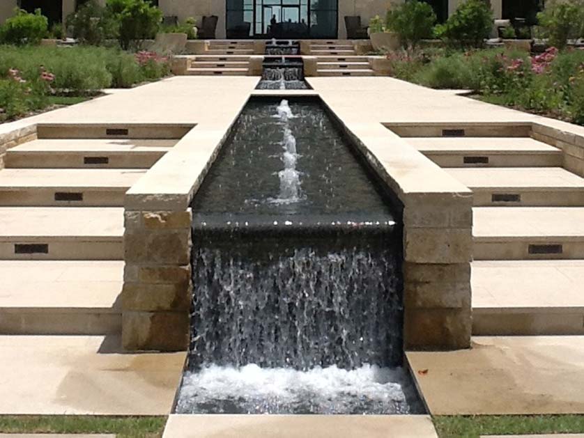 La Cantera Resort & Spa outdoor landscaping and waterfall installed by Optima Pools.